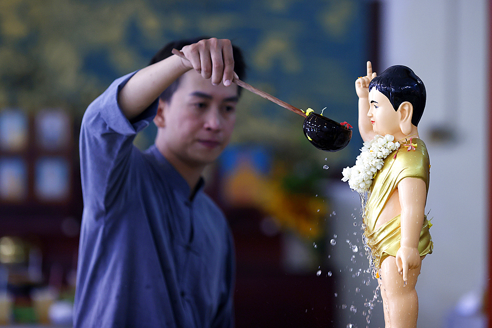 Thien Quang buddhist pagoda. Vesak celebration. Birthday of Shakyamuni Buddha. Bathing infant Buddha to Purify the heart. Tan Chau. Vietnam.