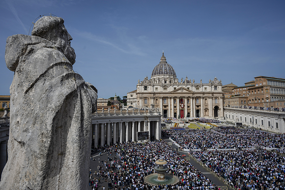 Cardinal Angelo Comastri presides over the Easter Mass as part of the Holy Week celebrations, at St Peter's square in the Vatican on April 20, 2025.
