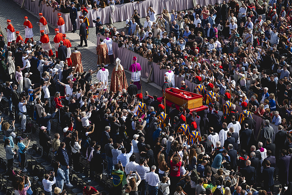 Pallbearers carry the coffin of the late Pope from the chapel of Santa Marta to St. Peter's Basilica in the Vatican on April 23, 2025.