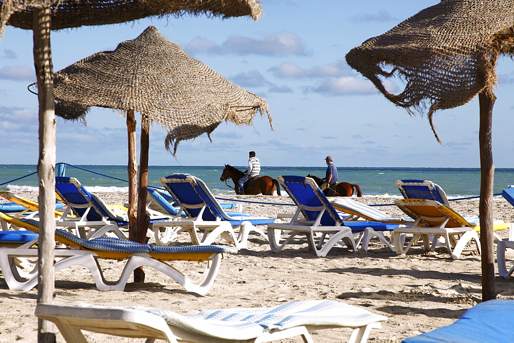 Beach scene on the Mediterranean coast in the tourist zone, Djerba Island, Tunisia, North Africa, Africa