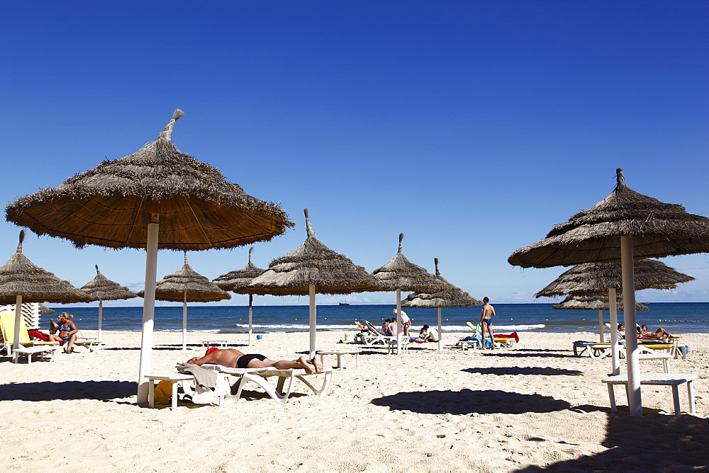 Beach scene in the tourist zone of Sousse, Gulf of Hammamet, Tunisia, North Africa, Africa