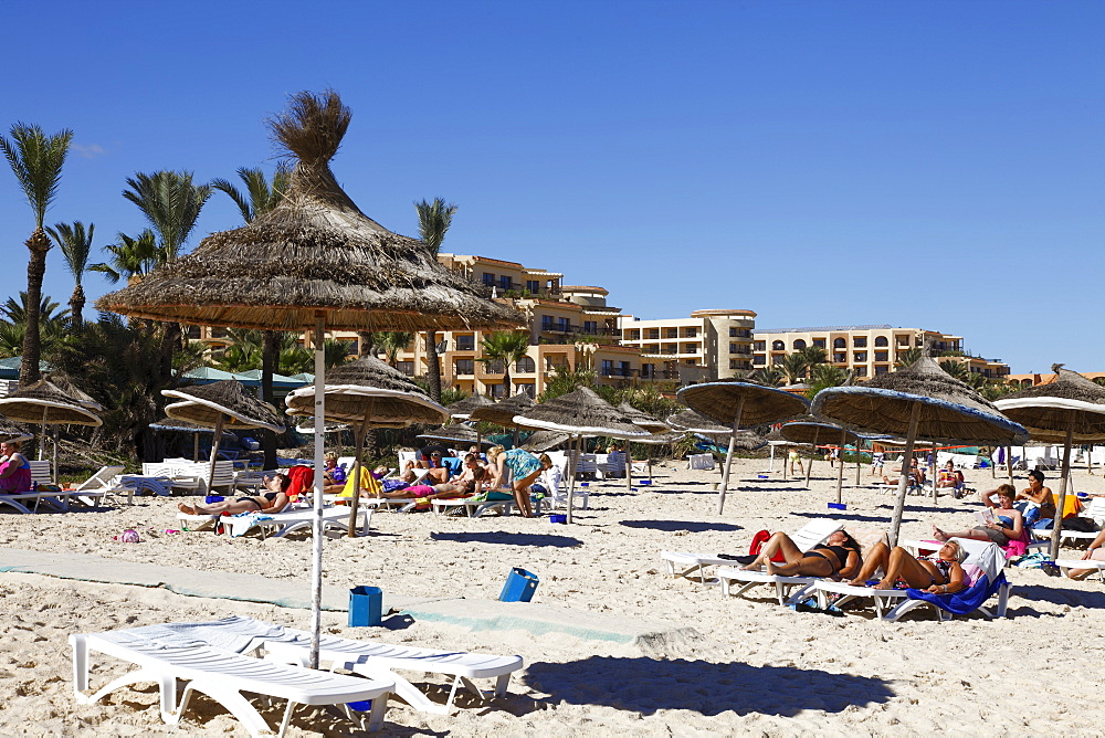 Beach scene in the tourist zone of Sousse, Gulf of Hammamet, Tunisia, North Africa, Africa