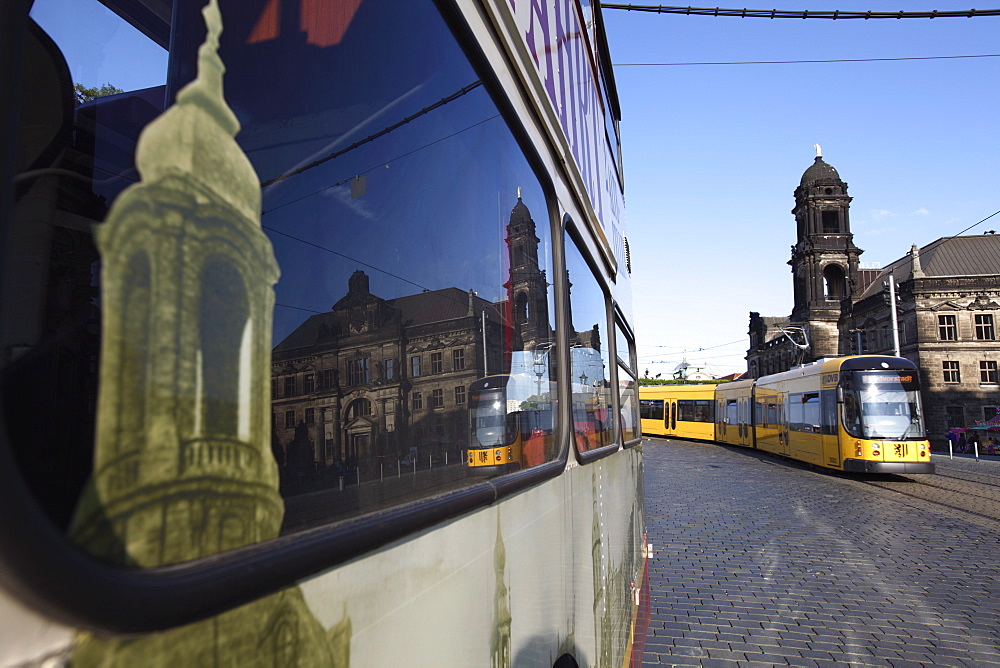 Reflection in bus window, tram on street and Neues Standehaus (New State House), Schlossplatz, Dresden, Saxony, Germany, Europe