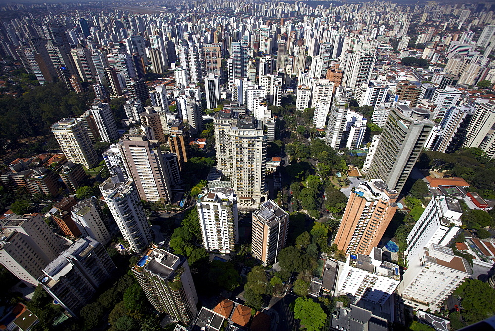 View over Sao Paulo skyscrapers and traffic jam from taxi helicopter, Sao Paulo, Brazil, South America