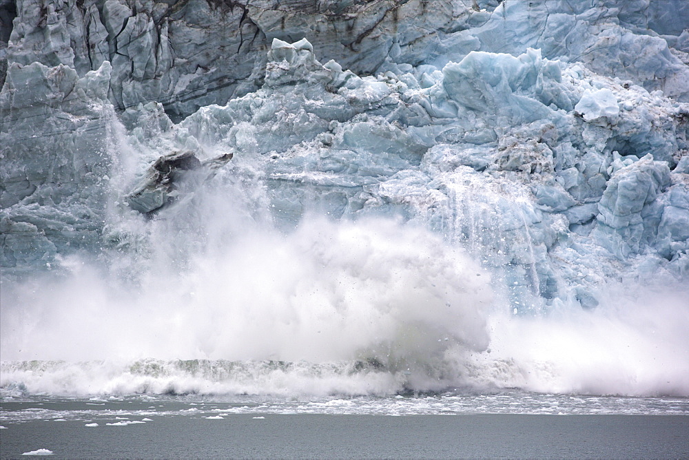 Ice falling from Glacier Pia, Tierra del Fuego, Chile, South America