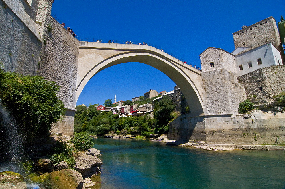 Famous old bridge reconstructed after collapsing in the war in the old town of Mostar, UNESCO World Heritage Site, Bosnia-Herzegovina, Europe