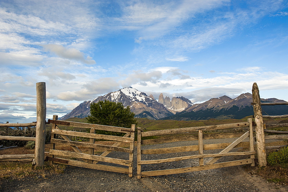 Cattle gate with the towers of the Torres del Paine National Park in background, Patagonia, Chile, South America 