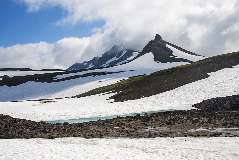 Snowfield below Mutnovsky volcano, Kamchatka, Russia, Eurasia