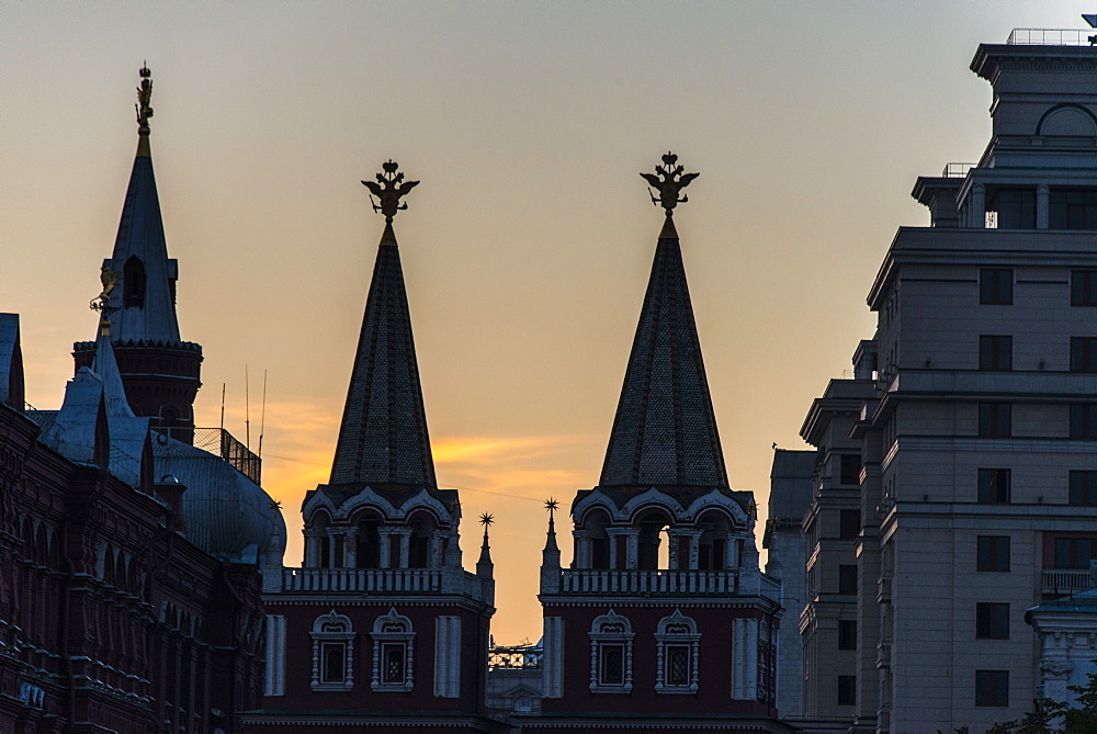 Silhouette of the History Museum and Resurrection Gate on Red Square at sunset, Moscow, Russia, Europe