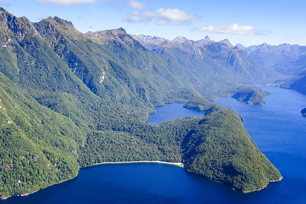 Aerial of a huge fjord in Fiordland National Park, UNESCO World Heritage Site, South Island, New Zealand, Pacific