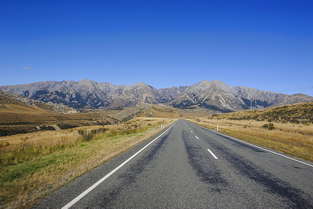 Road leading through the beautiful mountain scenery around Arthur's Pass, South Island, New Zealand, Pacific