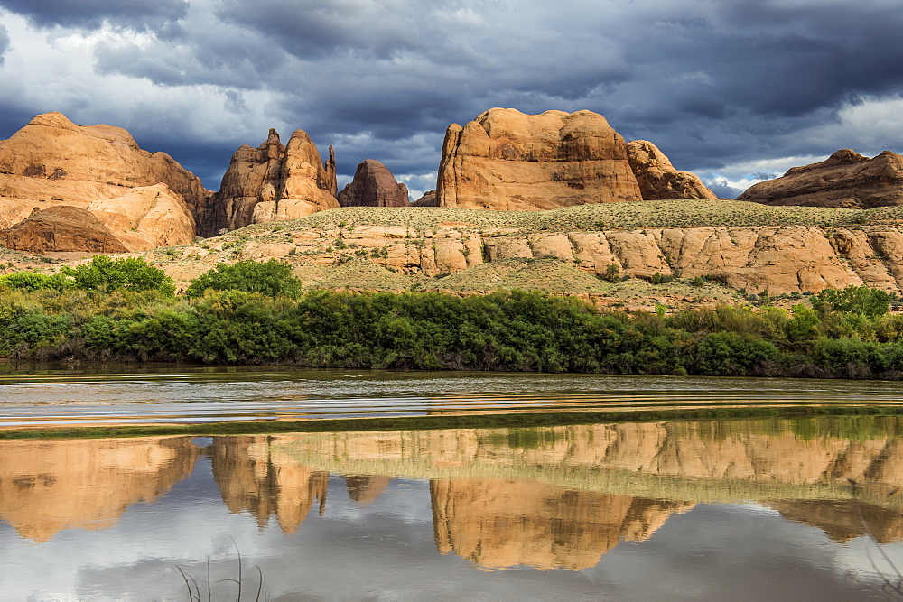 Sandstone rocks reflecting in the Colorado River, Canyonlands National Park, Utah, United States of America, North America