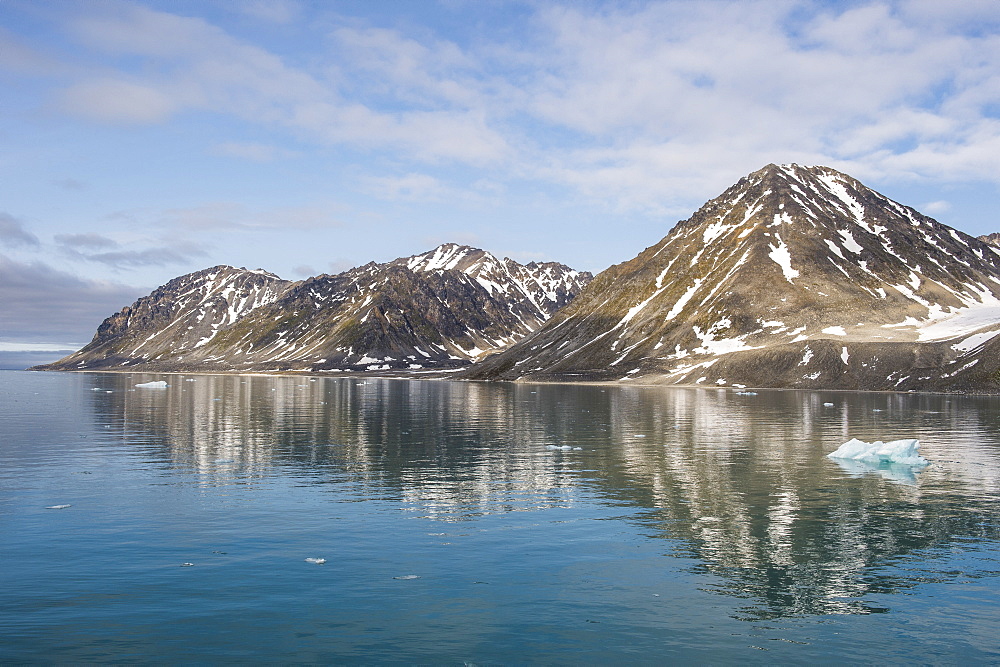 Mountains reflecting in the water in the Magdalenen Fjord, Svalbard, Arctic, Norway, Scandinavia, Europe 