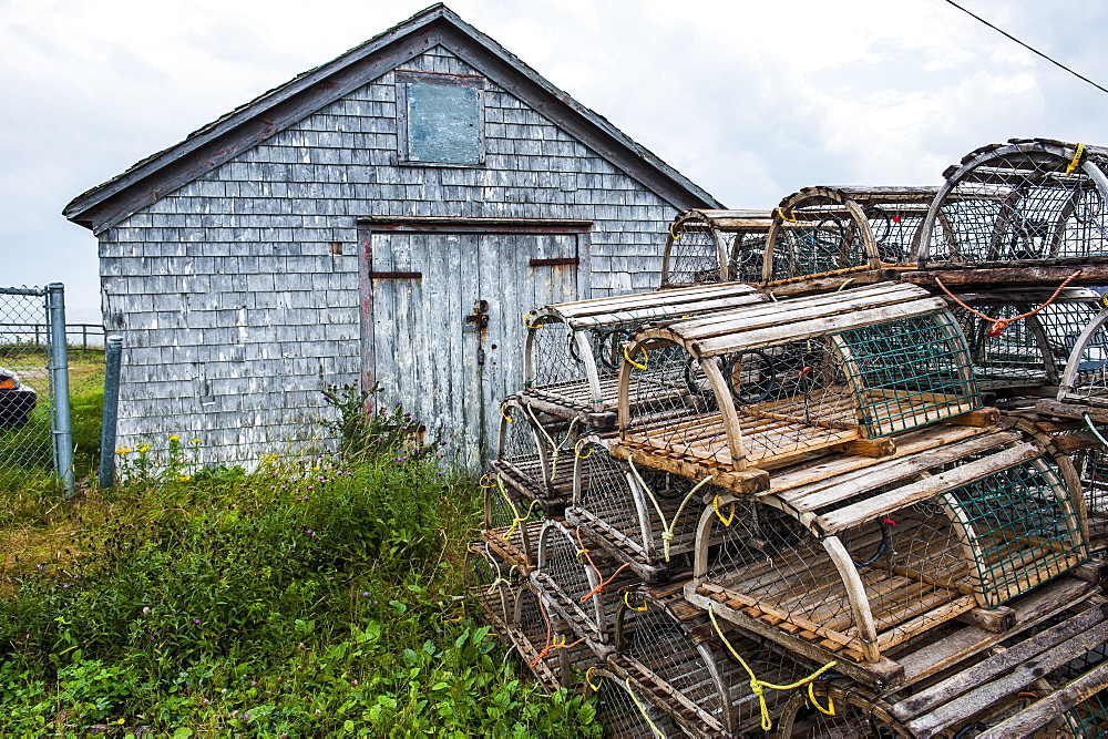 Fish traps in front of a shingle hut in Neils Harbour, Cape Breton Highlands National Park, Cape Breton Island, Nova Scotia, Canada, North America 