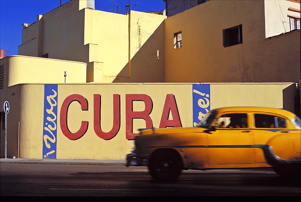 Street scene with old 1950s car, Havana, Cuba, West Indies, Central America