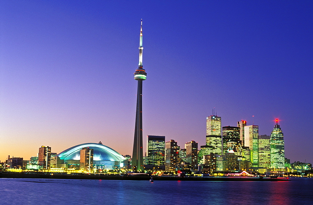 City skyline from the Toronto Islands, showing the CN Tower at dusk, Toronto, Ontario, Canada, North America