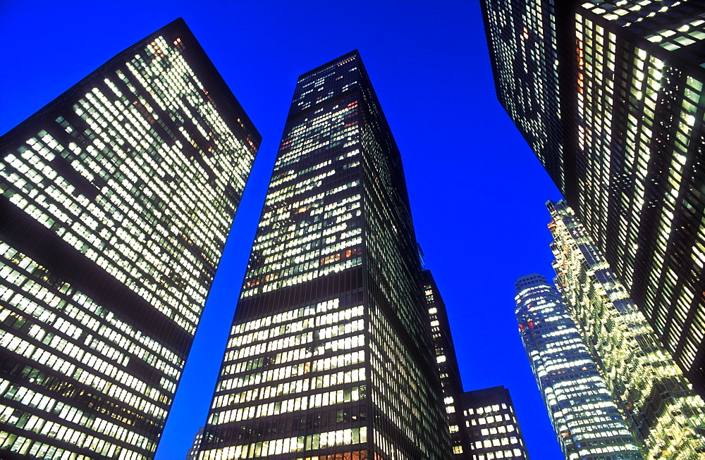 Office towers in the financial district illuminated at night, Toronto, Ontario, Canada, North America