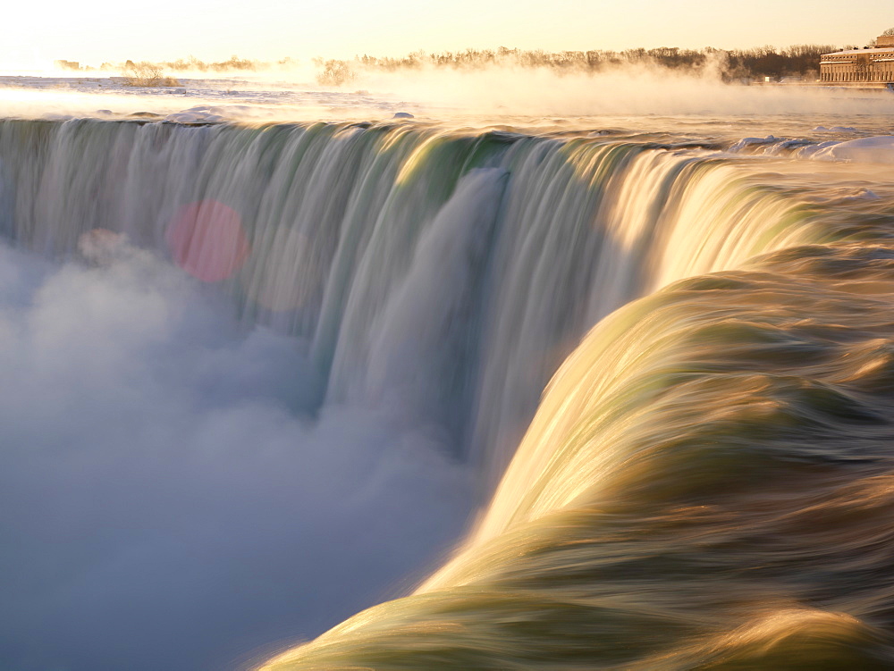 Brink of the Canadian Falls at sunrise in winter, Niagara Falls, Ontario, Canada, North America