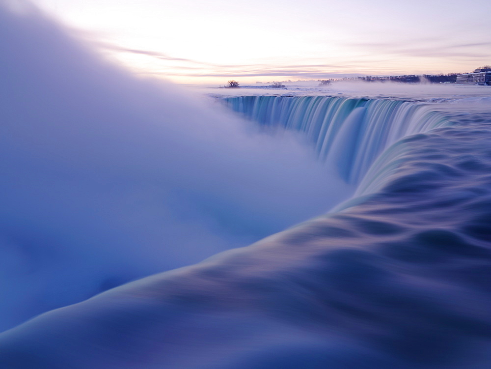 Brink of the Canadian Falls at sunrise in winter, Niagara Falls, Ontario, Canada, North America