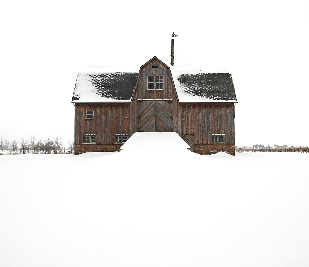 Wooden barn dating from circa 1870, in the winter, St. Catharines, Niagara Region, Ontario, Canada, North America