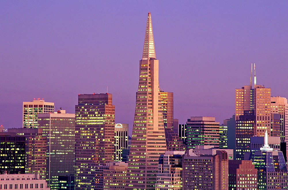 View of city skyline with TransAmerica Building at dusk, San Francisco, California, United States of America, North America