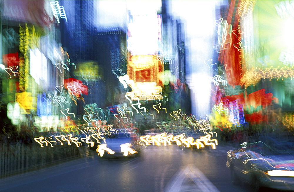 Street with lights blurred and panned, New York City, New York, United States of America, North America