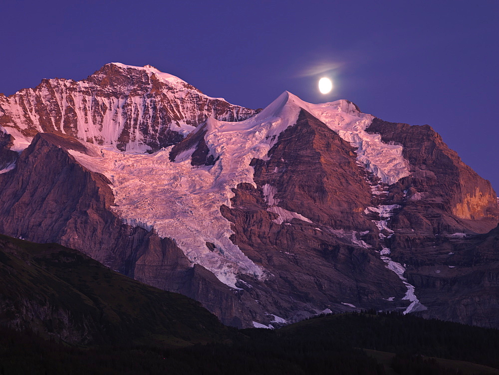 Eiger mountain with moonrise, Jungfrau Region, Wengen, Switzerland, Europe