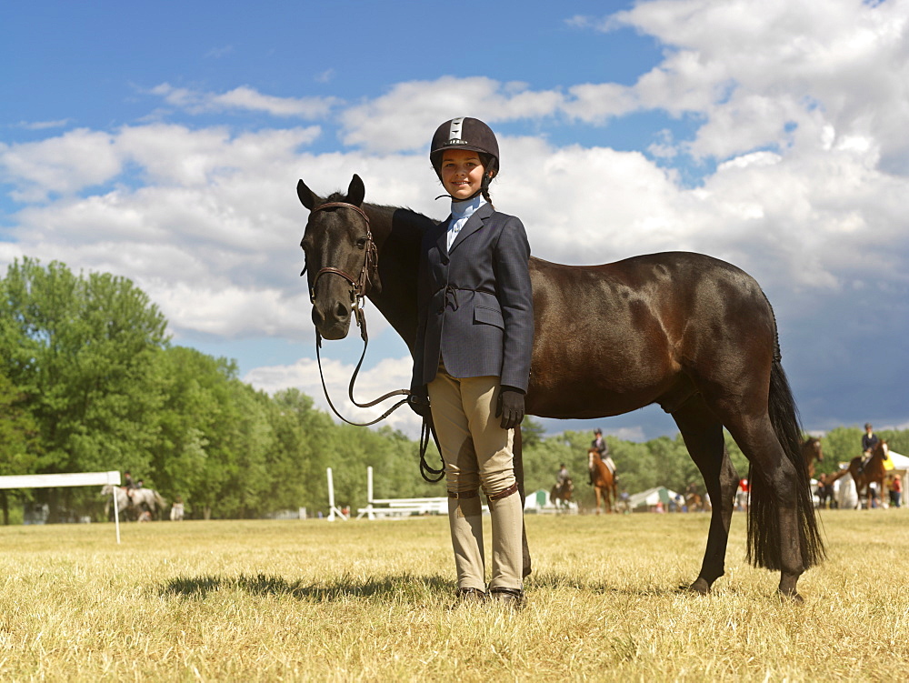 Girl posing with her horse, Niagara-on-the-Lake, Ontario, Canada, North America