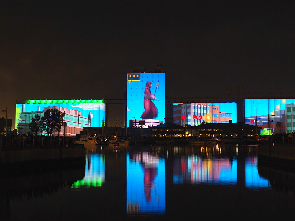 The Image Mill, light and sound show by Robert Lepage and Ex Machina, the largest projection ever, using fine technology to project a huge quantity of iimages and films on an oversized screen on the grain silos of the Quebec Harbour, Quebec City, Quebec, Canada, North America