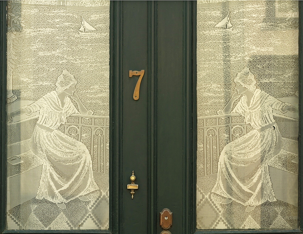 Lace curtains on a doorway window, Quebec City, Quebec, Canada, North America