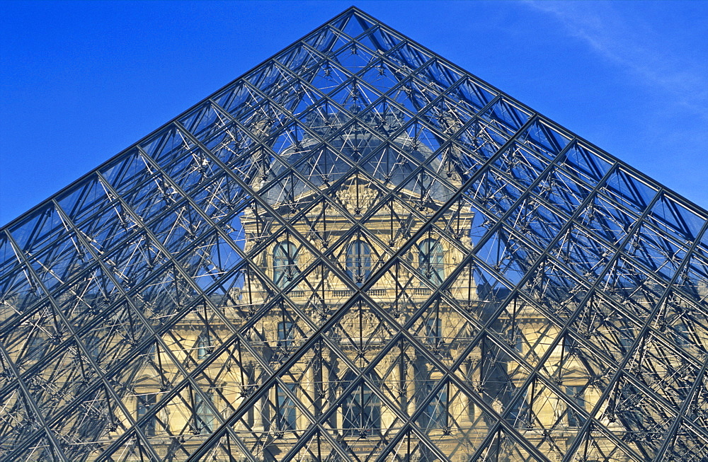 The Louvre reflected in the Pyramid by I M Pei, Paris, France, Europe