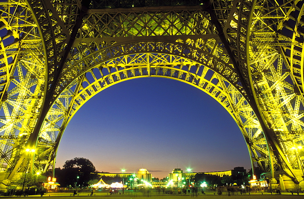 The Eiffel Tower illuminated at night, low angle view from below the tower, Paris, France, Europe