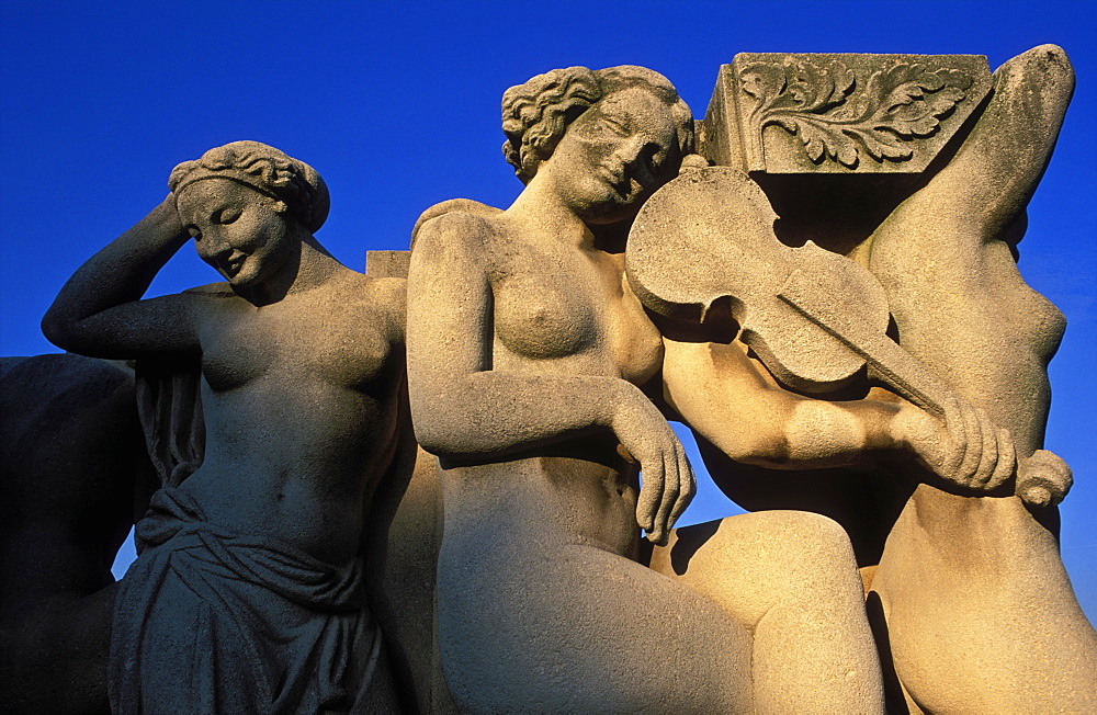 Statues of woman with a violin at the Trocadero, Paris, France, Europe