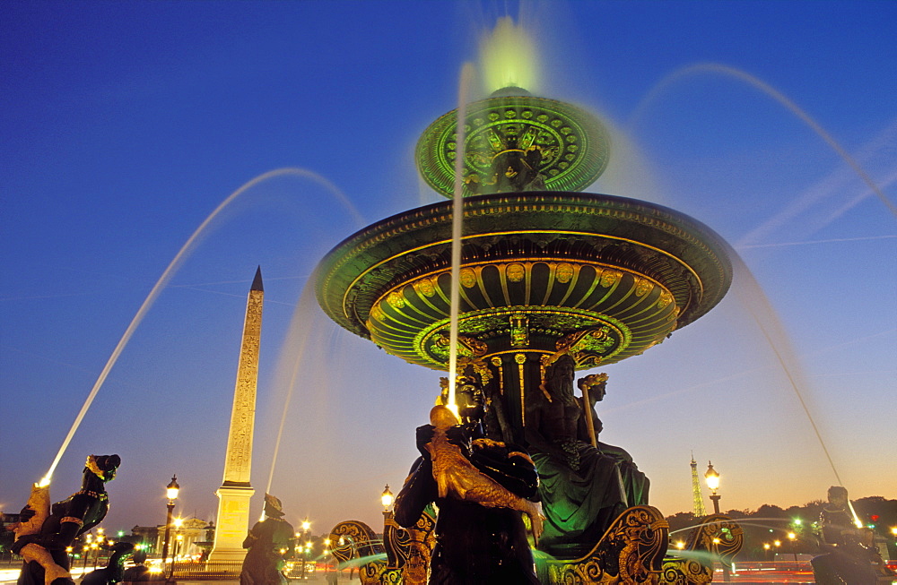 Fountains and Place de la Concorde illuminated at night, Paris, France, Europe