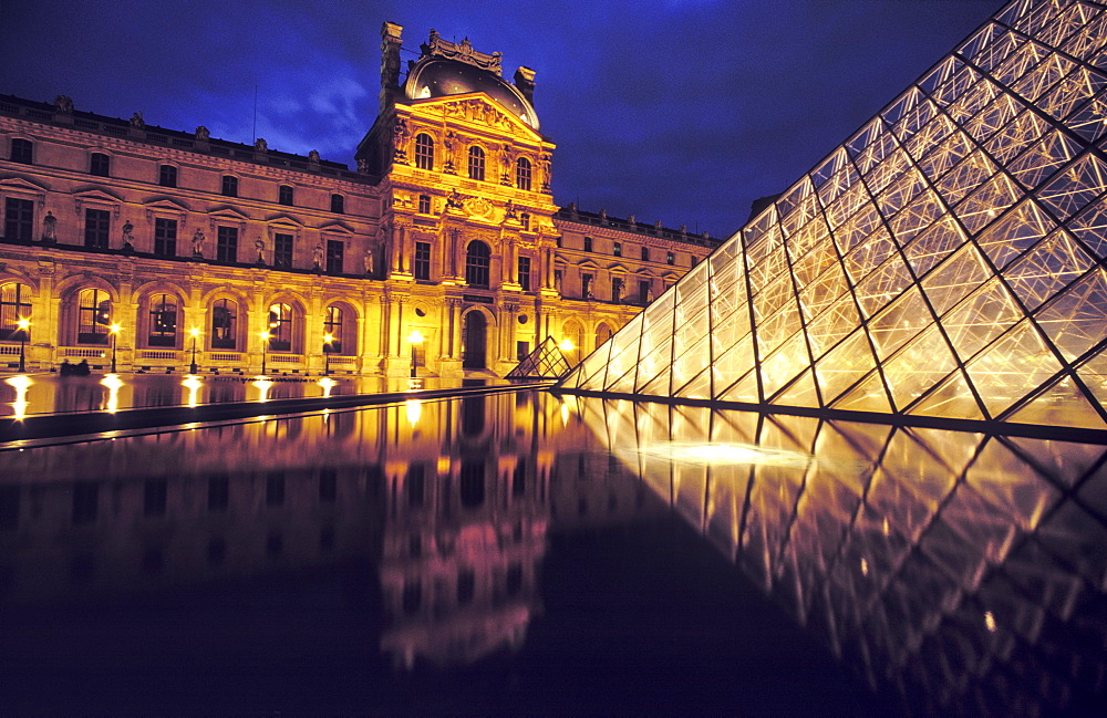 The Louvre at night, Paris, France, Europe