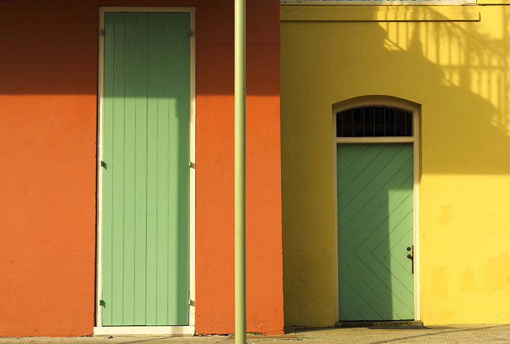 Colorful buildings with green doors, French Quarter, New Orleans, Louisiana, United States of America, North America