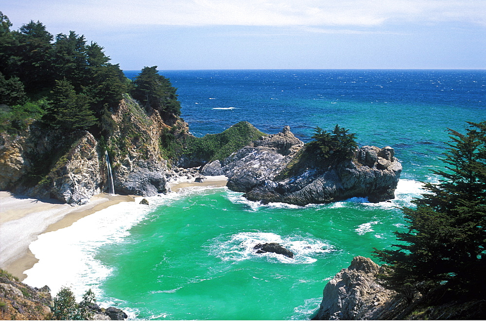 Waterfall spilling into the Pacific Ocean, Julia Pfeiffer Burns State Park, Big Sur, California, United States of America, North America