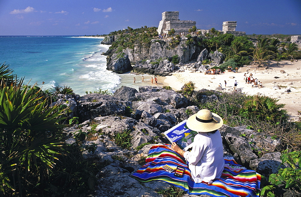 Woman sketching ruins, Tulum, Yucatan, Mexico, North America