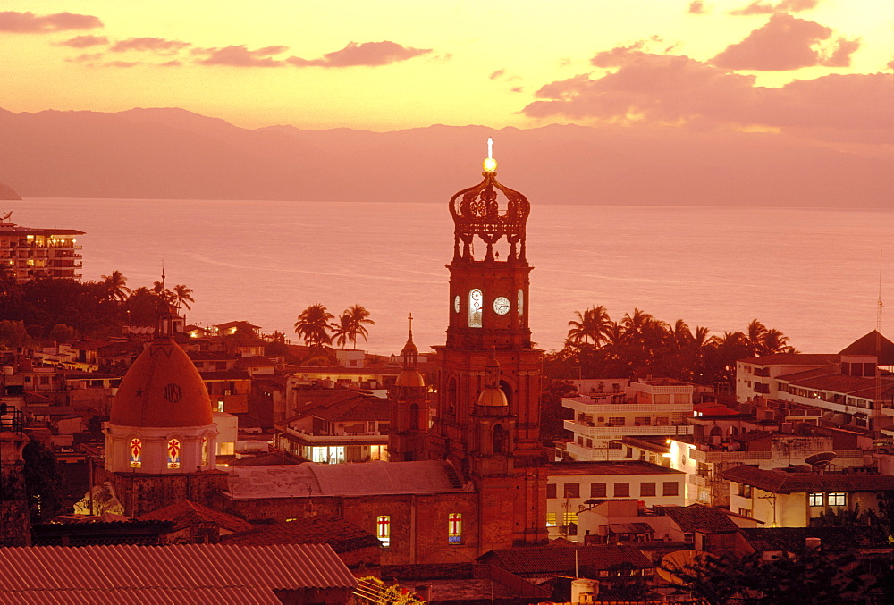 Bell tower and cupola, Church Our Lady of Guadalupe at dusk, Puerto Vallarta, Mexico, North America