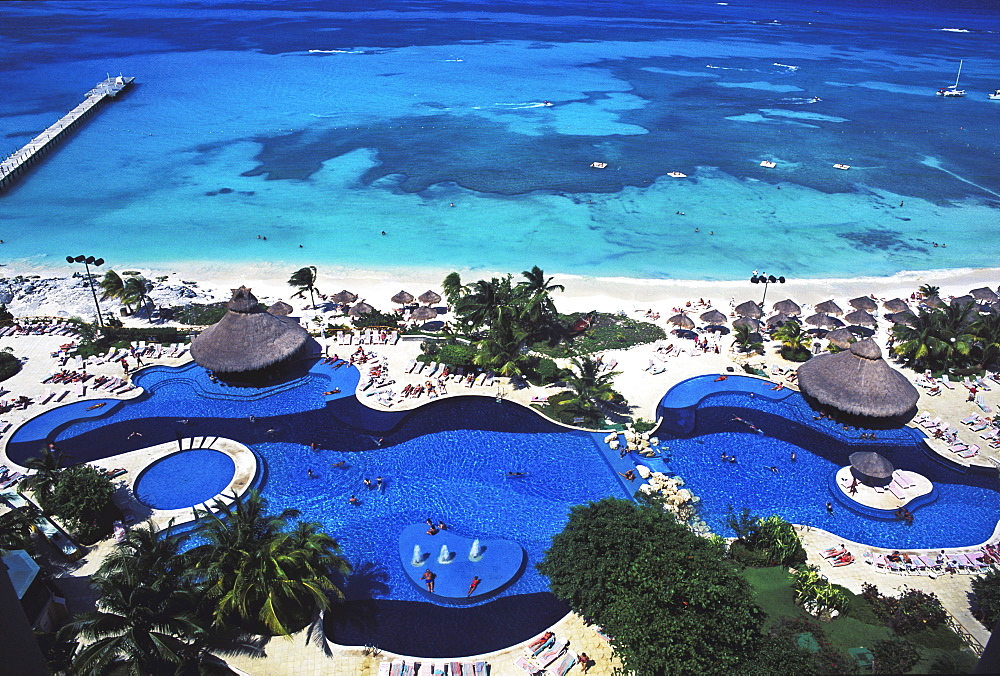 Pool at a resort facing the Caribbean Sea, Cancun, Yucatan, Mexico, North America