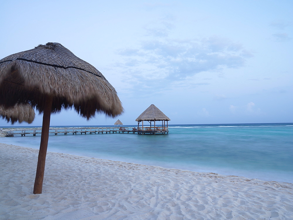 Palapa, with pier beyond, Mayan Riviera, Akumal, Yucatan, Quintana Roo, Mexico, North America