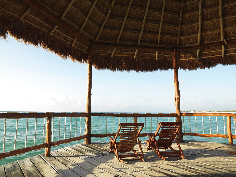 Two deckchairs under a palapa, with view of the sea, Mayan Riviera, Akumal, Yucatan, Quintana Roo, Mexico, North America