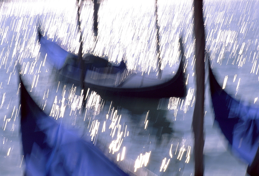 Blurred gondolas and water highlights, Venice, UNESCO World Heritage Site, Veneto, Italy, Europe