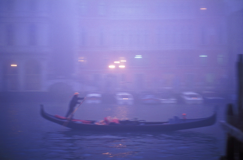 Grand Canal with gondolier in fog, Venice, UNESCO World Heritage Site, Veneto, Italy, Europe