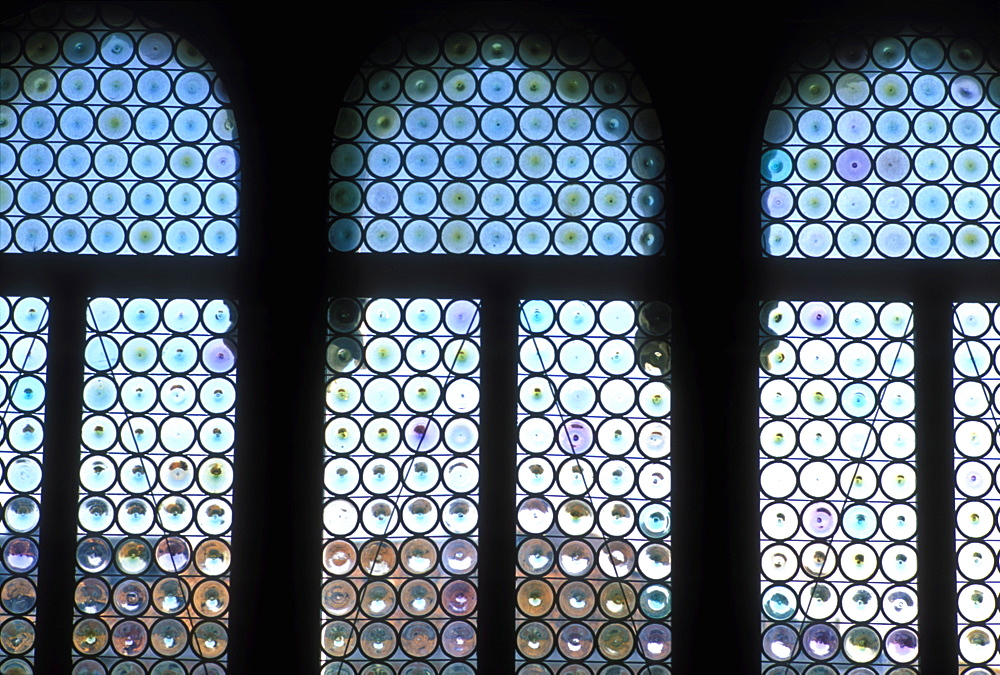 Detail of windows with stained Venetian glass in the Doge's Palace (Palazzo Ducale), Venice, UNESCO World Heritage Site, Veneto, Italy, Europe