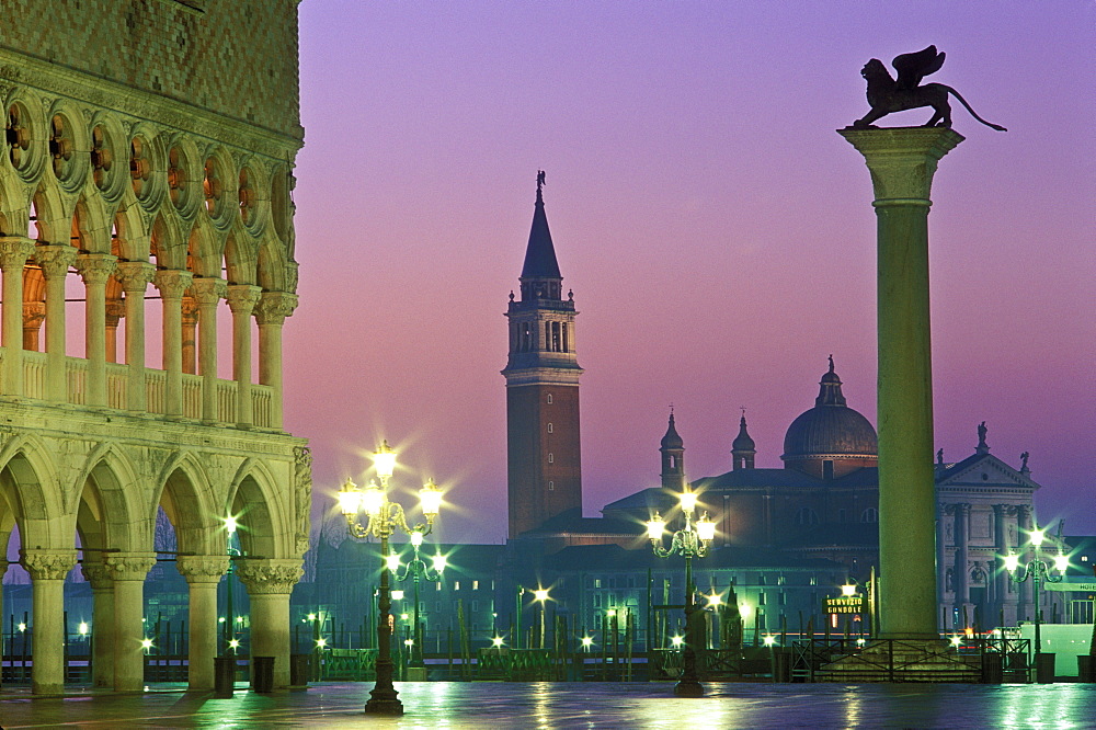 View of San Giorgio Maggiore from Piazzetta San Marco with the Column of San Marco and the Doge's Palace at dawn, Venice, UNESCO World Heritage Site, Veneto, Italy, Europe