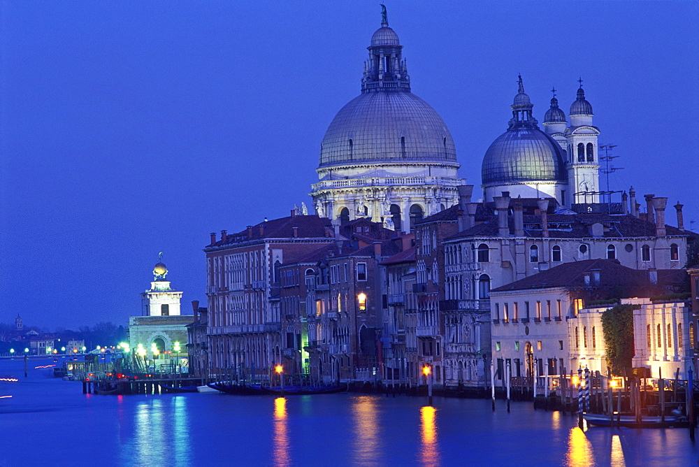 The Grand Canal with Santa Maria della Salute at dusk, Venice, UNESCO World Heritage Site, Veneto, Italy, Europe