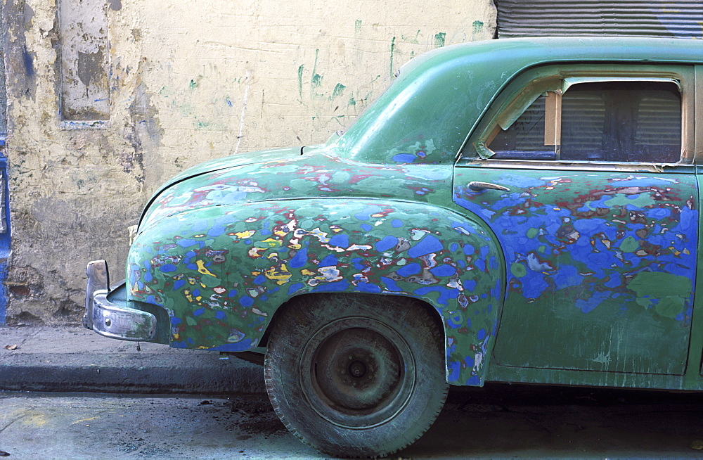 Colorful old car primed many times for a paint job, Havana, Cuba, West Indies, Central America