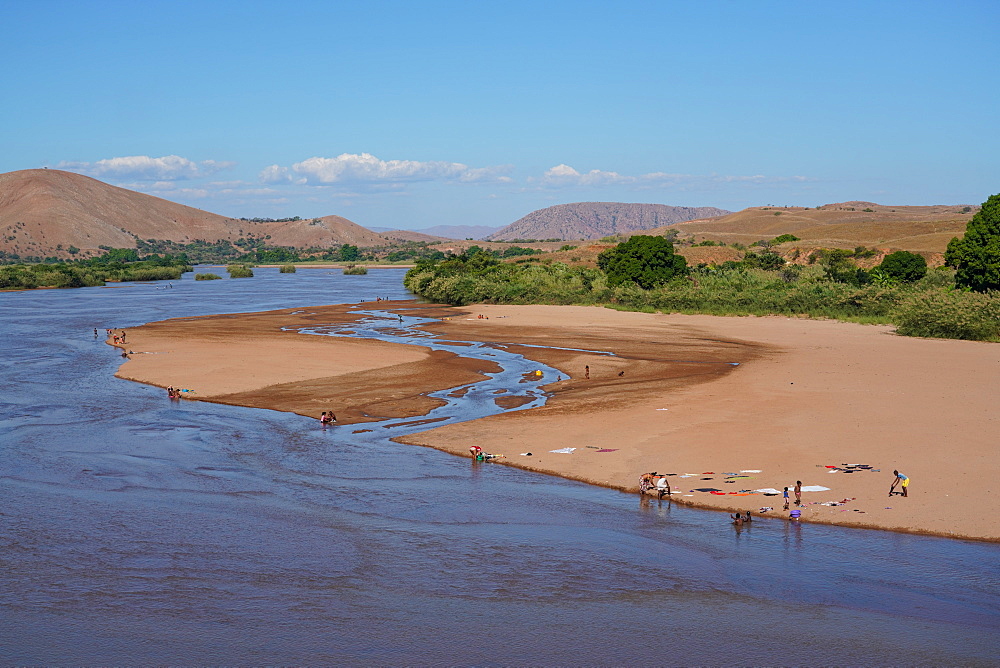 People washing clothes in the Manambolo River, Ambatolahy, Miandrivazo district, Menabe Region, Madagascar, Africa