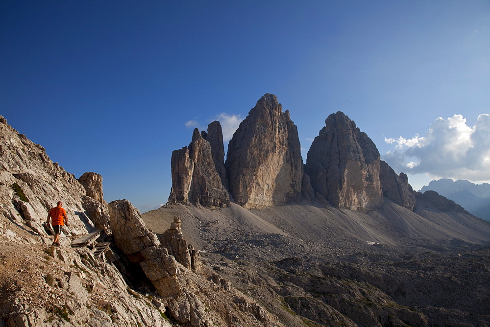 Hiking in front of Tre Cime di Lavaredo, Dolomites, eastern Alps, South Tyrol, Bolzano province, Italy, Europe